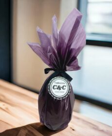 HUEVO DE PASCUA CON CONEJOS Y HUEVITOS (150GR)