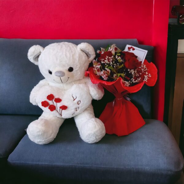 .OSO CON RAMO DE FLORES